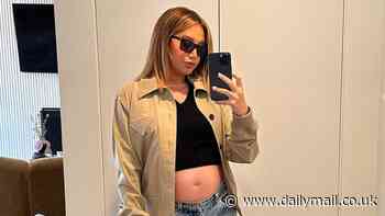 Ashley Tisdale displays her baby bump in a crop top and 'the only jeans that will fit me right now' as she expects her 2nd child with Christopher French