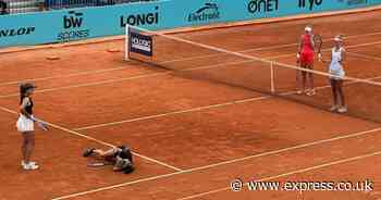 Madrid Open star collapses to the floor after ball hits her head and opponent kicks off