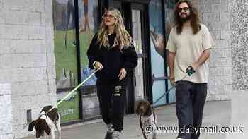Heidi Klum keeps it casual in black sweatsuit with husband Tom Kaulitz as they walk their two German shorthaired pointers in LA