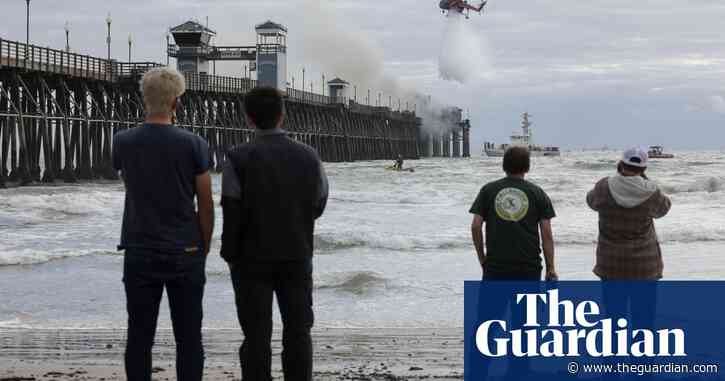 Crews battle fire threatening longest wooden pier on US west coast