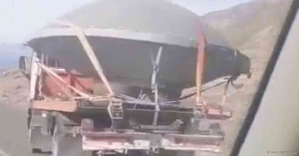 ‘UFO’ hauled down desert road by a tractor trailer in bizarre new photos