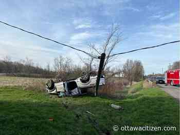 Driver escapes injury as crash brings power line down onto vehicle