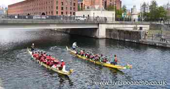 Crowds gather at Queens Dock for traditional Dragon Boat Festival race