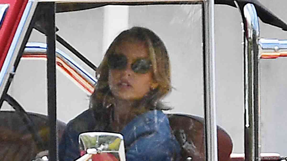 Sydney Sweeney cruises in cherry red 1969 Ford Bronco to lunch at Beverly Hills Hotel... after hitting back at producer who said she's 'not pretty and can't act'