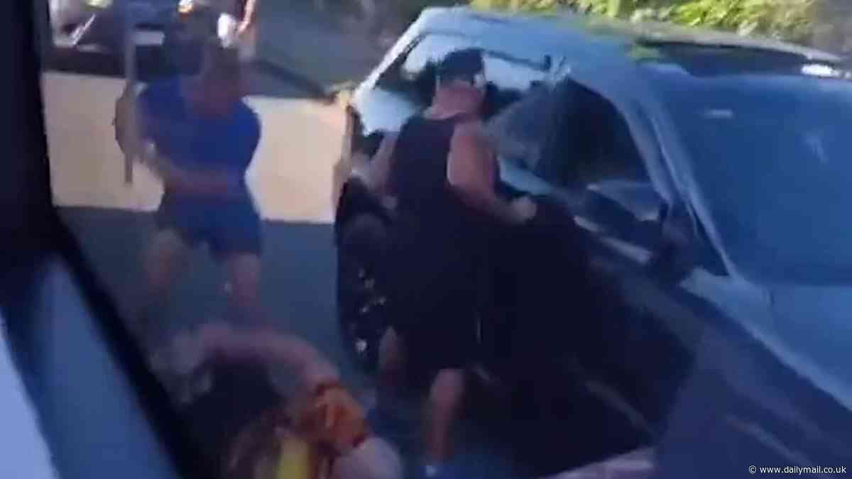 Bli Bli road rage attack: Wild moment barefoot tradie beats his opponent with a spirit level in front of horrified school children