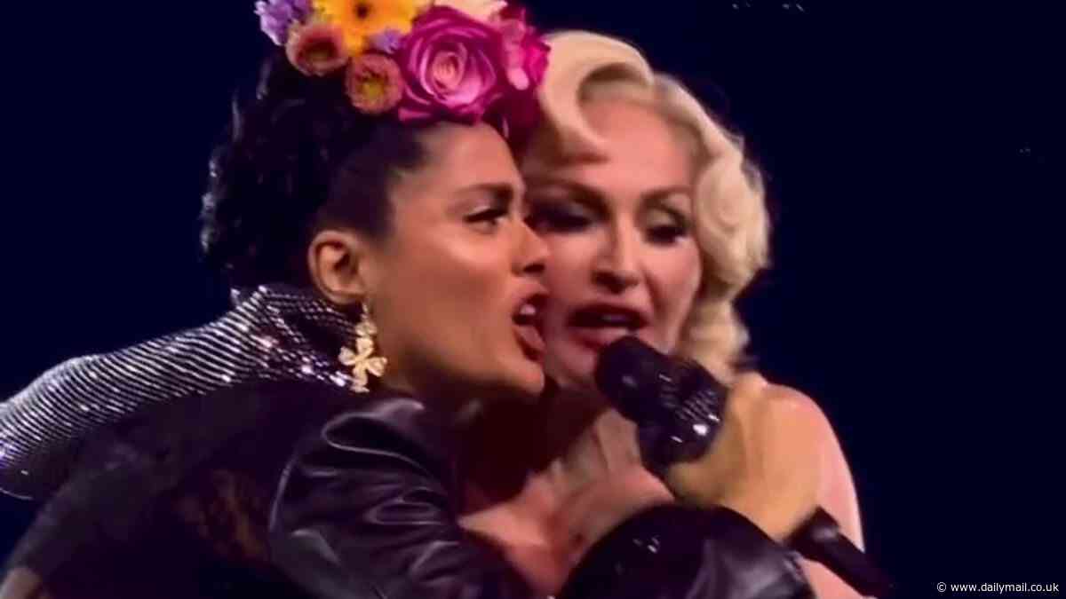 Salma Hayek dresses up as Frida Kahlo to join Madonna on stage at her Mexico concert - 22 YEARS after playing artist in Oscar-winning biopic