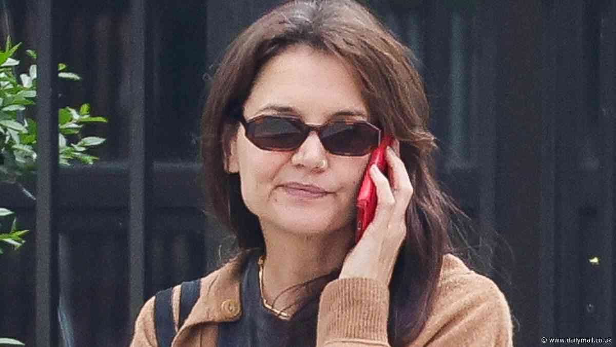 Katie Holmes pays tribute to NY punk band Ramones as she rocks vintage T-shirt during Manhattan errand run... after celebrating Suri Cruise's 18th birthday