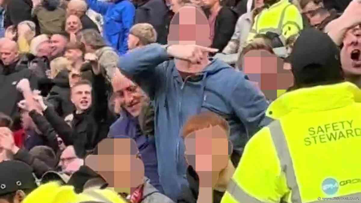 Police charge Burnley fan, 44, arrested for tragedy chanting after he was spotted 'mocking the Munich air disaster with sick plane gestures' during draw with Man United at Old Trafford
