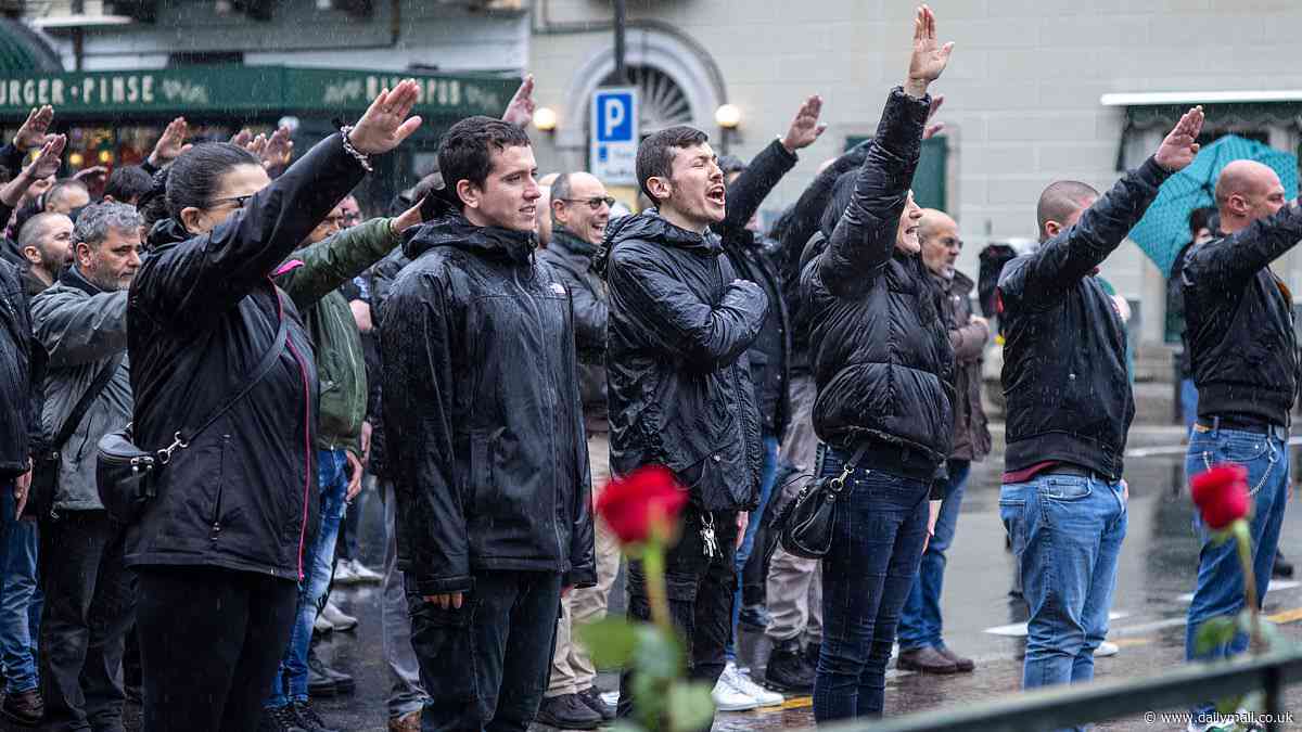 Horrifying moment dozens of Italian men give fascist salute on anniversary of dictator Benito Mussolini's execution