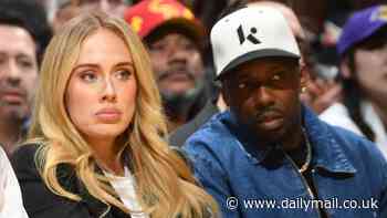 Adele looks stunning in chic black and white ensemble as she sits courtside with husband Rich Paul at Lakers v Nuggets game in LA
