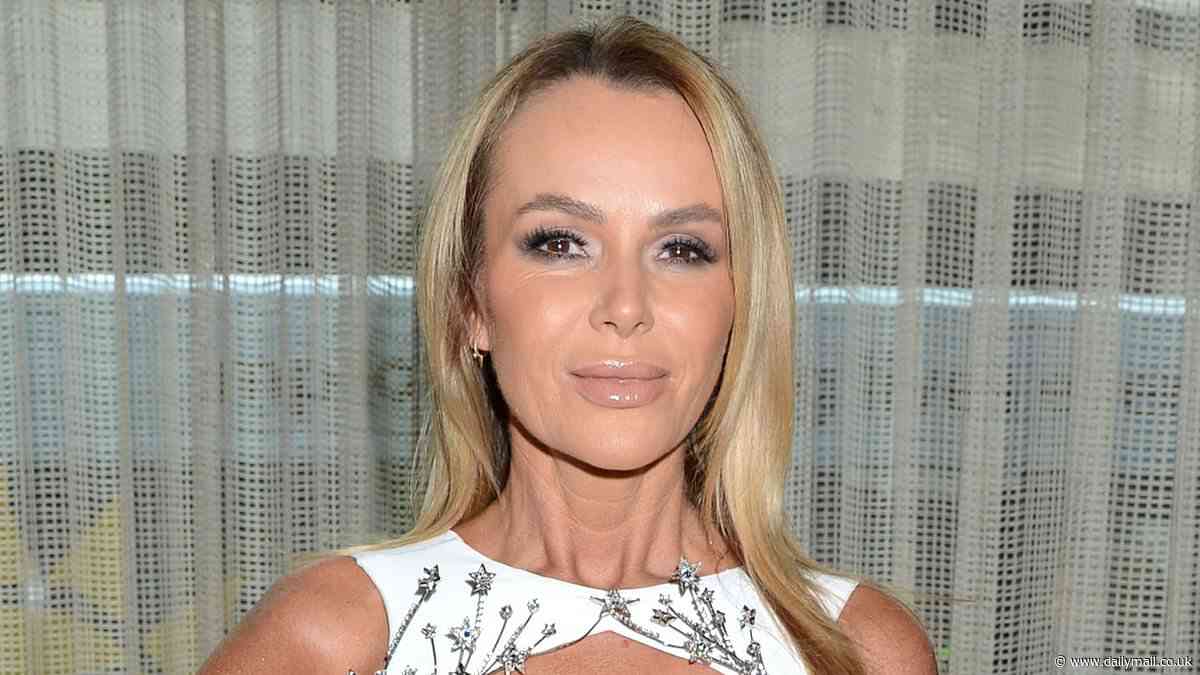 Amanda Holden flashes her cleavage in a cut-out white gown while Abbey Clancy wows in a plunging dress with Rochelle Humes at the star-studded Variety Club Showbusiness Awards