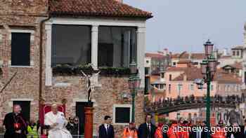Pope visits Venice to speak to artists and inmates and finds city taxing day-trippers