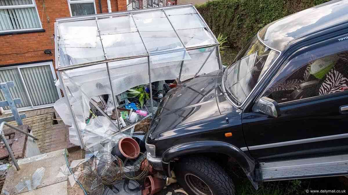 Couple left 'fearing for their lives' after enormous Mitsubishi 4x4 rolls away from road and careers into their back garden