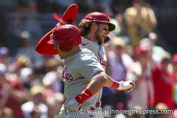 Stott and Realmuto homer, Walker makes a slick play as the Phillies win 8-6 to sweep the Padres