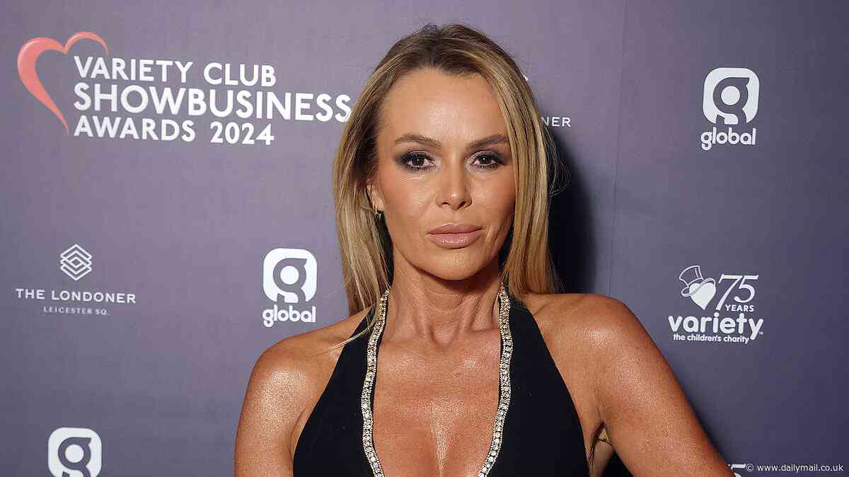Amanda Holden stuns in a plunging black and white gown after swapping out of an equally daring dress as she hosts the star-studded Variety Club Showbusiness Awards