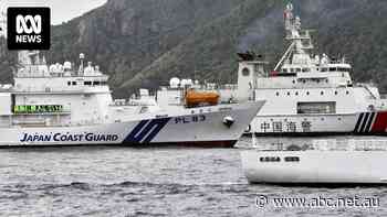 China's coast guard challenges Japanese delegation at sea