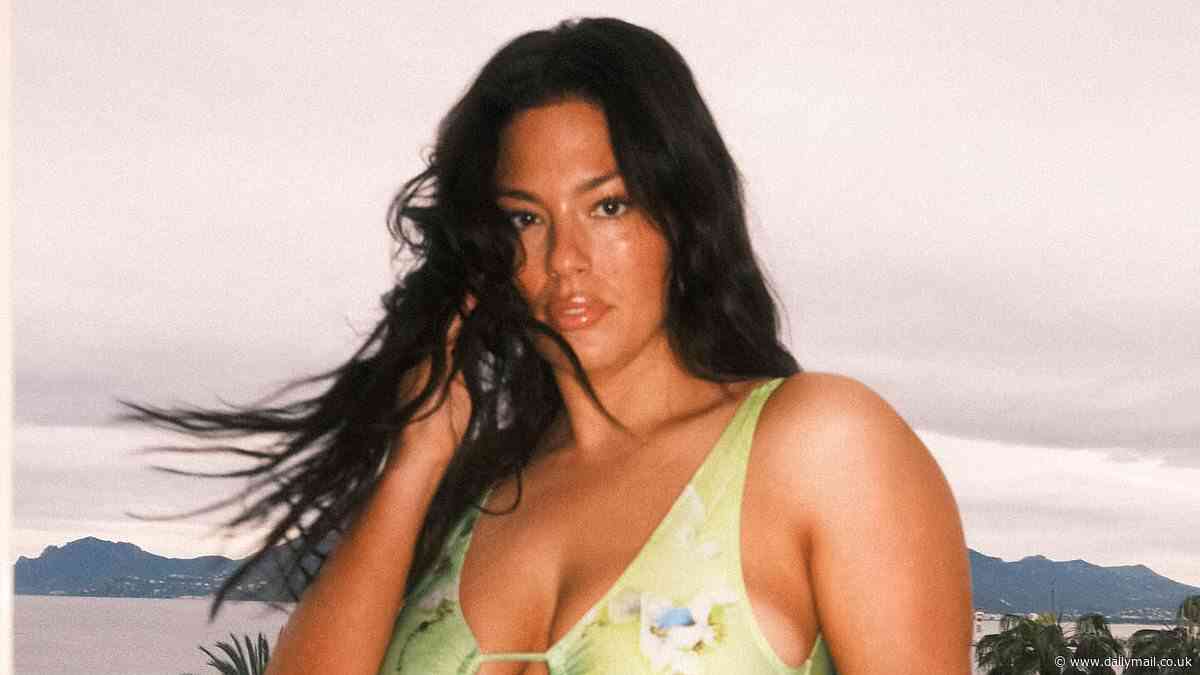 Ashley Graham puts on a busty display and shows off her curves in a plunging bathing suit in Cannes