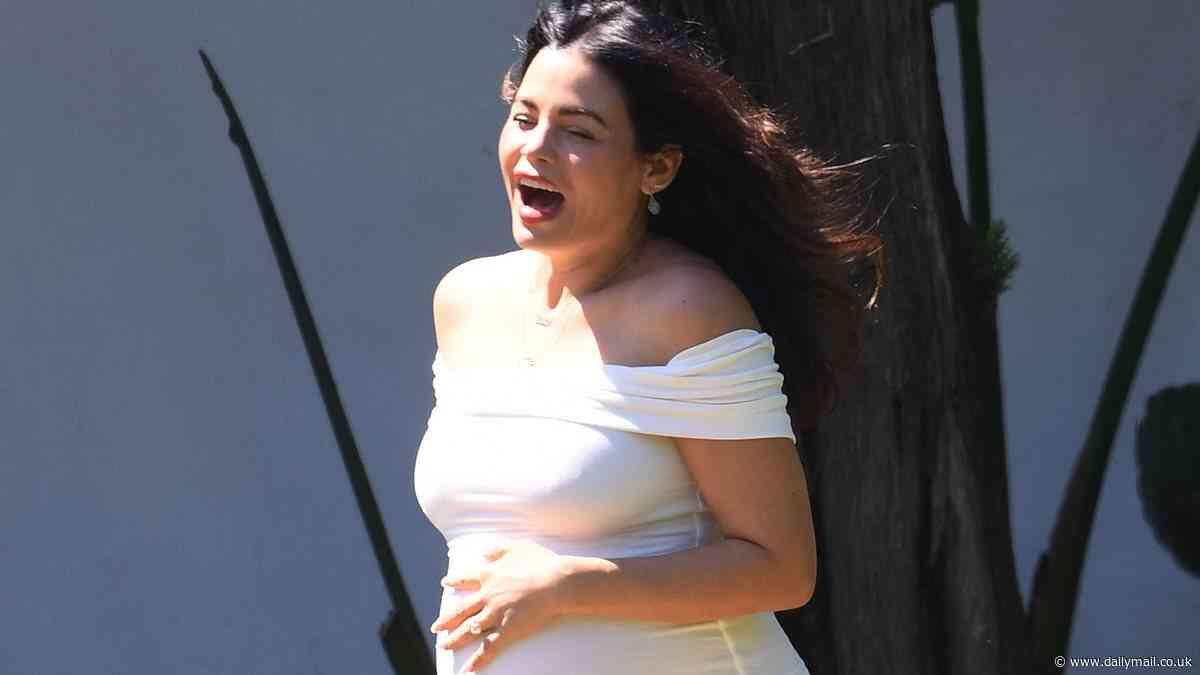 Pregnant Jenna Dewan beams while showcasing substantial bump in white dress at baby shower in Los Angeles