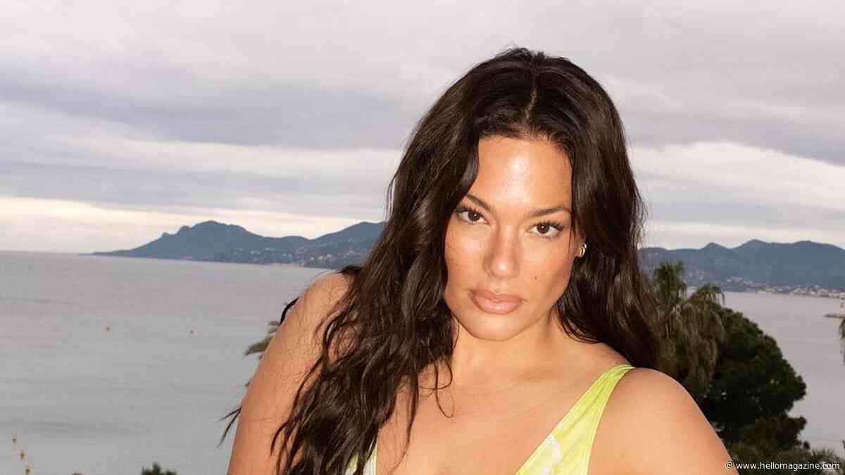 Ashley Graham rocks her incredible physique in plunging green swimsuit