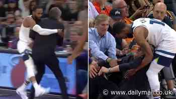 Timberwolves coach Chris Finch is injured by his own player after brutal collision with Mike Conley late on in playoff win vs Suns... with 54-year-old 'feared to have torn his patella tendon' before team dumped Phoenix out