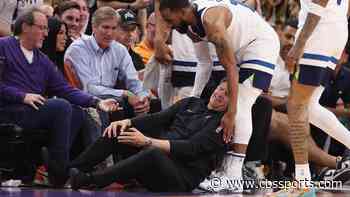 Timberwolves coach Chris Finch suffers torn patellar tendon after collision with Mike Conley