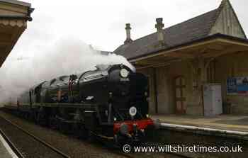 Steam trains British Pullman and Black Five head through Wiltshire