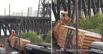 Steel Bridge Gets Completely Shut Down After Freight Train Derailment, HazMat Team Summoned