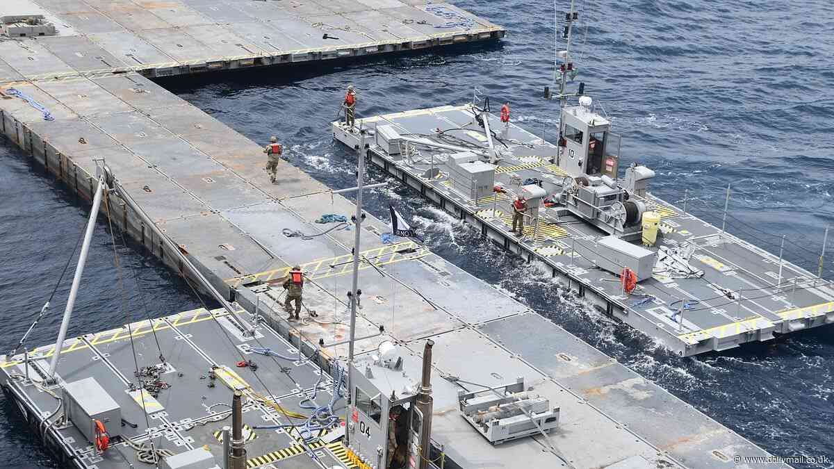 First photos of the $320 million US aid pier off Gaza: 1,00 Army and Navy members keep building despite fears Americans could be attacked, fury from Republicans and criticism that food is blocked on land