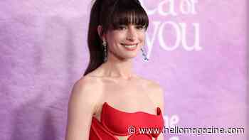 Anne Hathaway is a vision in red strapless gown after star opened up about her sobriety journey