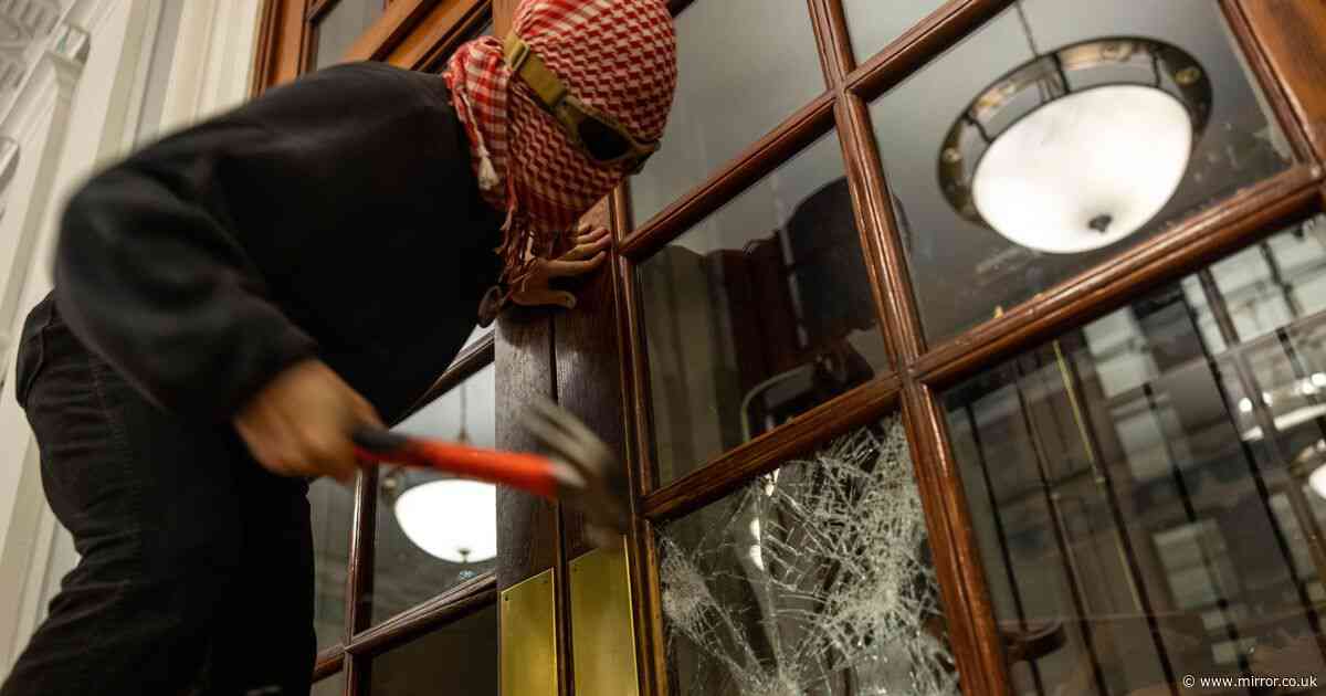 Columbia University: Masked student protesters take over campus building after smashing windows