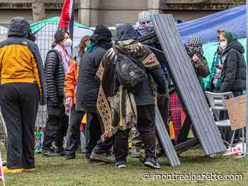 Threatened by court action and storms, encampment at McGill continues
