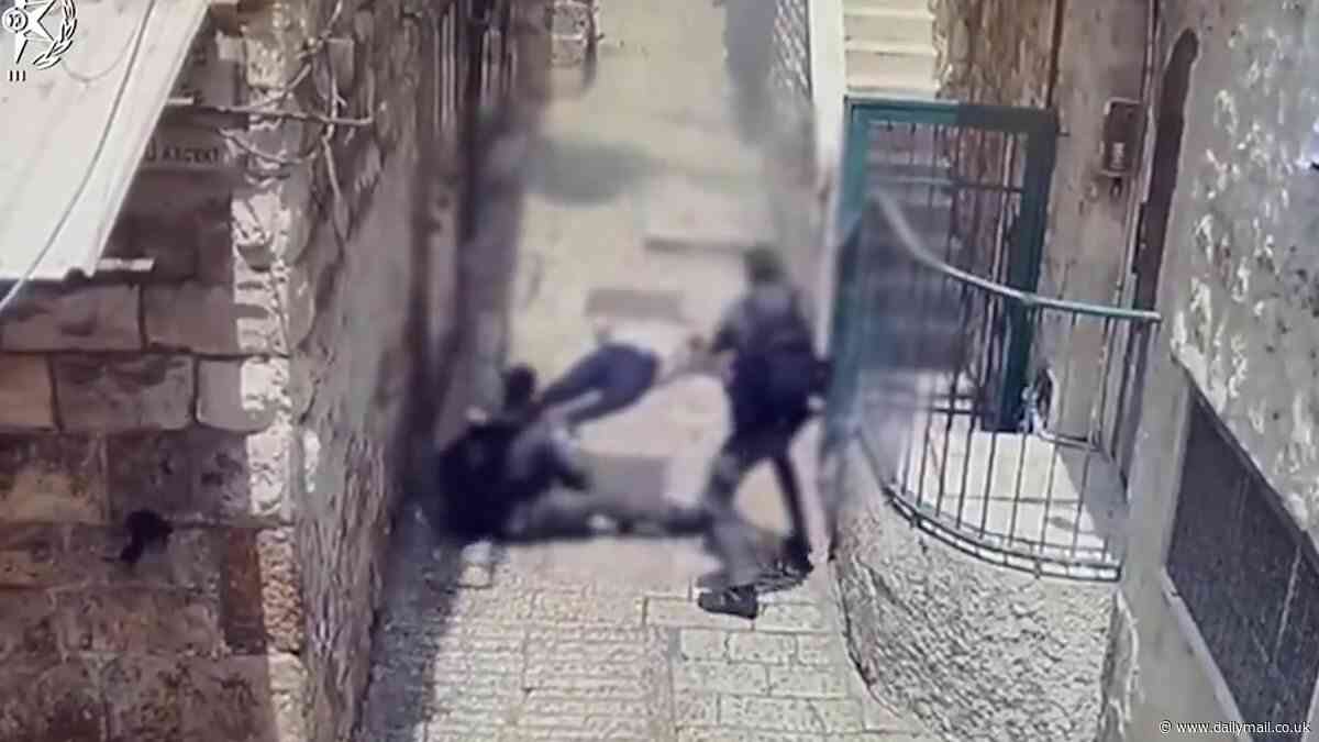 Terrifying moment Turkish knifeman lunges at two Israeli police officers in Jerusalem before they overpower the attacker and shoot him dead