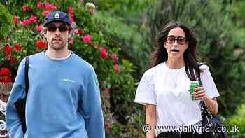 Brad Pitt's girlfriend Ines De Ramon takes a stroll with male pal in LA - amid ongoing bitter Brangelina divorce battle