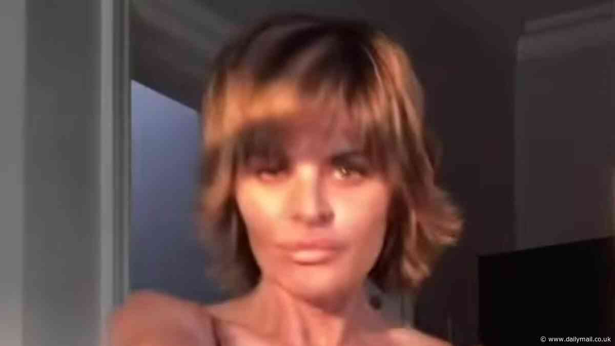 Lisa Rinna, 60, showcases her toned figure in a lacy black bra as she shows off sexy dance moves in throwback video ahead of the MET Gala: 'I'm really excited'