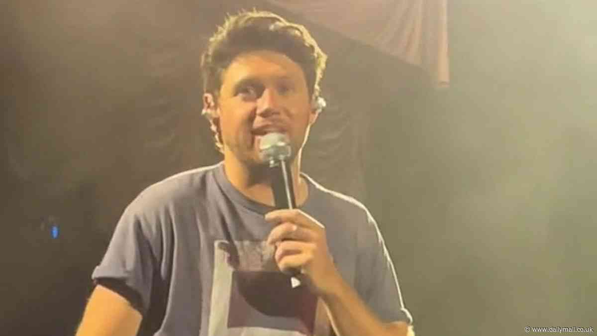 Bizarre moment Niall Horan is caught pointing and laughing at an Australian fan who was crying at his show