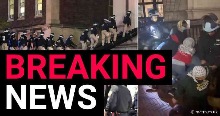 Hundreds of riot police storm university after stand-off with protesters