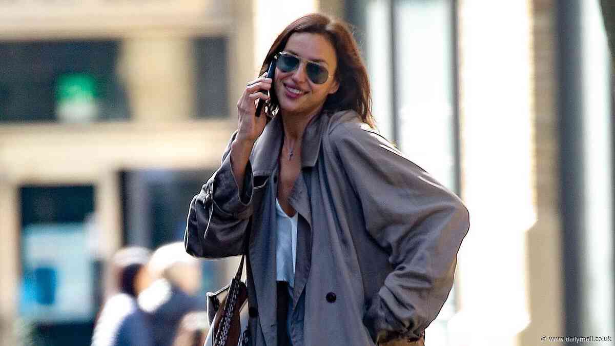 Irina Shayk rocks duster coat and sneakers while stepping out in New York City...amid claims she wants to date Tom Cruise, 61