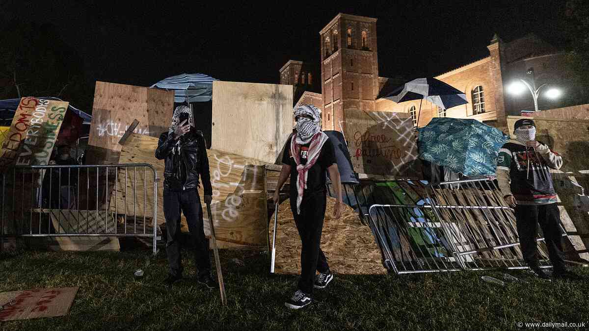 US campus protests LIVE: Violence breaks out UCLA pro-Palestinian encampment after 100 protesters are arrested at Columbia University when police storm student occupation