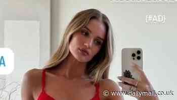Rosie Huntington-Whiteley sends temperatures soaring as she shows off her toned figure in red lingerie