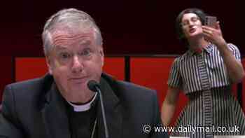 Pride in Protest activist Quay-Quay Quade interrupts Catholic Archbishop of Sydney Reverend Anthony Fisher during NSW Parliament hearing into proposed transgender law