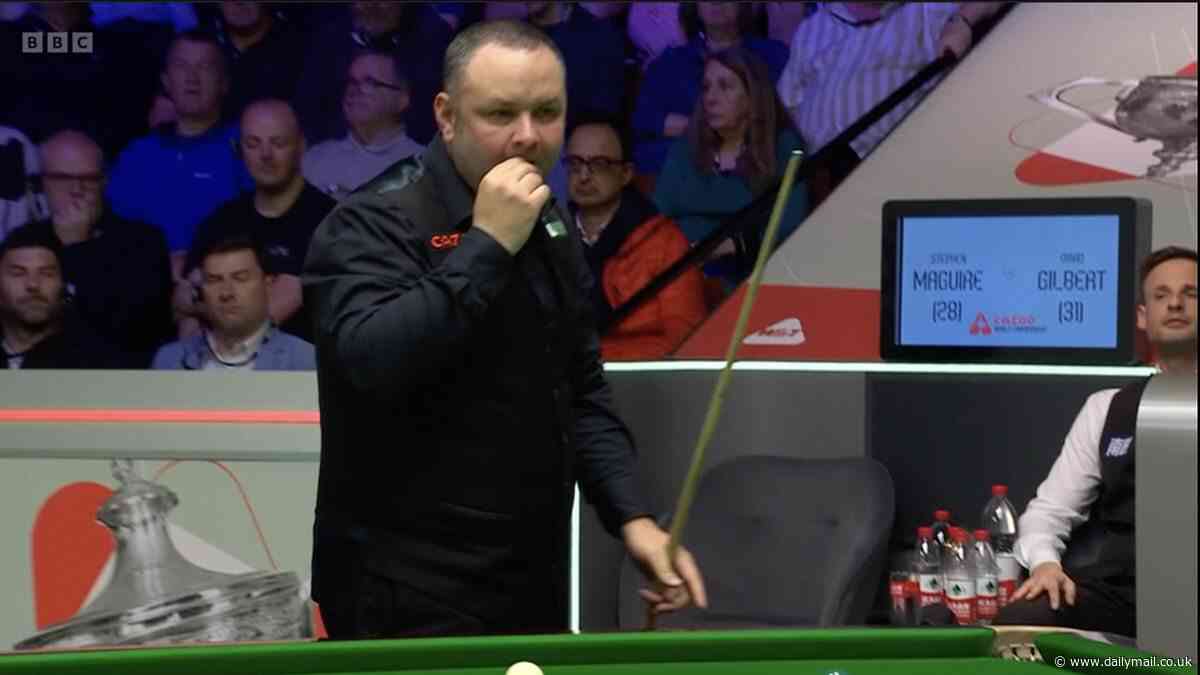 Snooker star Stephen Maguire appears to pick something off the table and EAT it in bizarre scenes during World Championship quarter-final