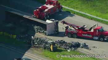 Scrap metal truck spills debris on Indiana highway after overturning