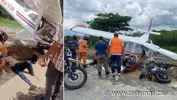 Plane making emergency landing in Colombia crashes into biker on road leaving him with serious injuries