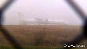 Charter plane overruns runway at St. John's airport