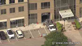 SUV crashes into Irving building, no one hurt