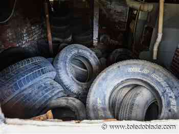 Resident wants Toledo to address abandoned house filled with tires