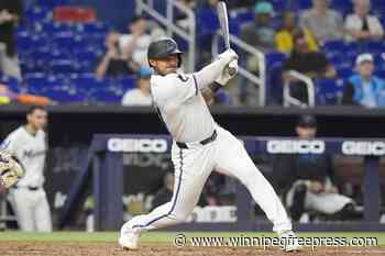 Muñoz strikes out seven over six innings to get 1st major league win, Marlins beat Rockies 4-1