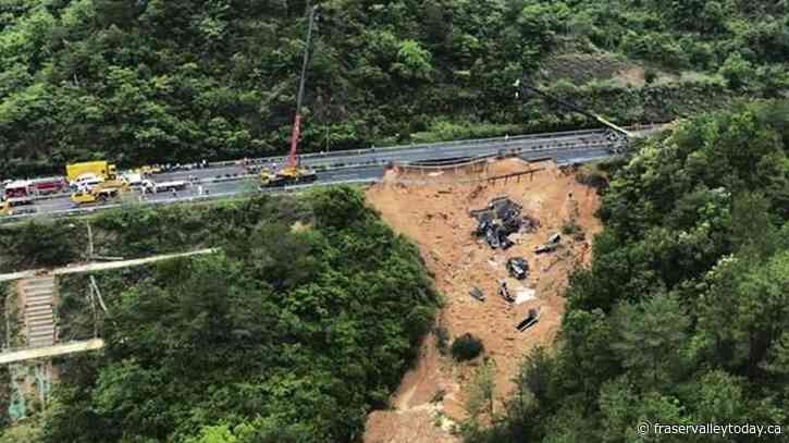 Death toll jumps to at least 48 in southern China highway collapse as search continues