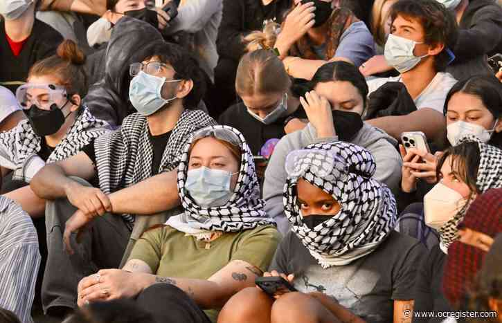 Why campus protesters aim for anonymity with face masks, checkered Palestinian kaffiyehs