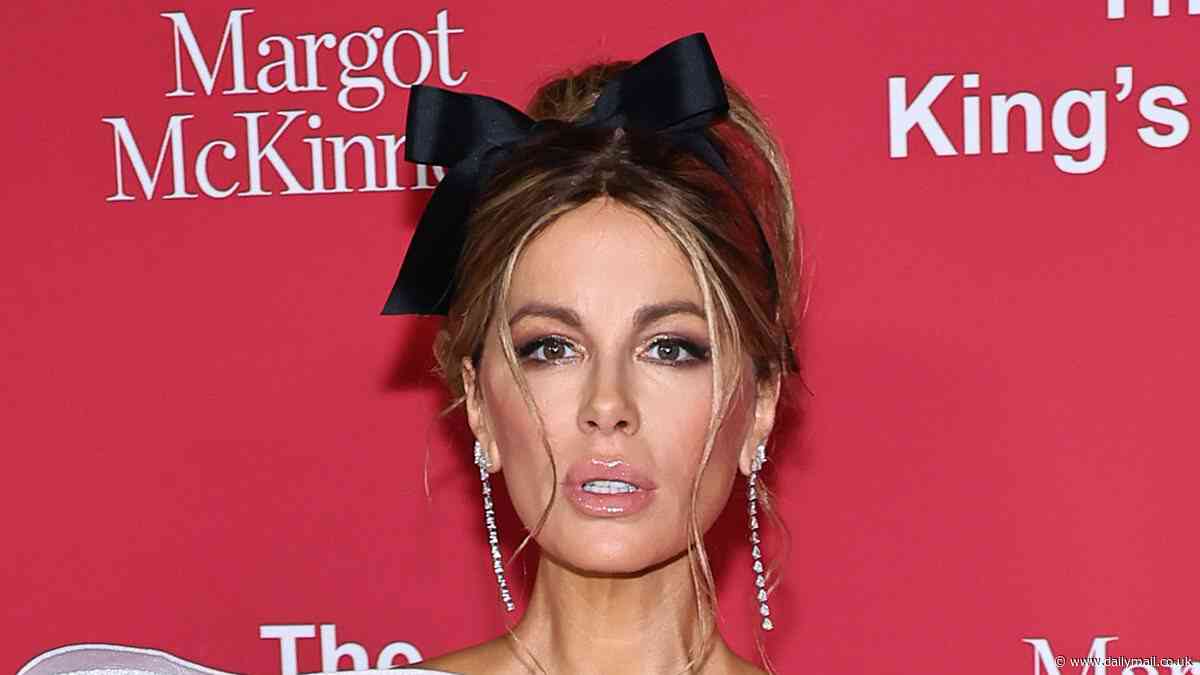 Kate Beckinsale returns to red carpet for first time since hospitalization for mystery illness: Actress wears thigh-baring gown and six-inch platforms to mingle with A-list at King's Trust Gala